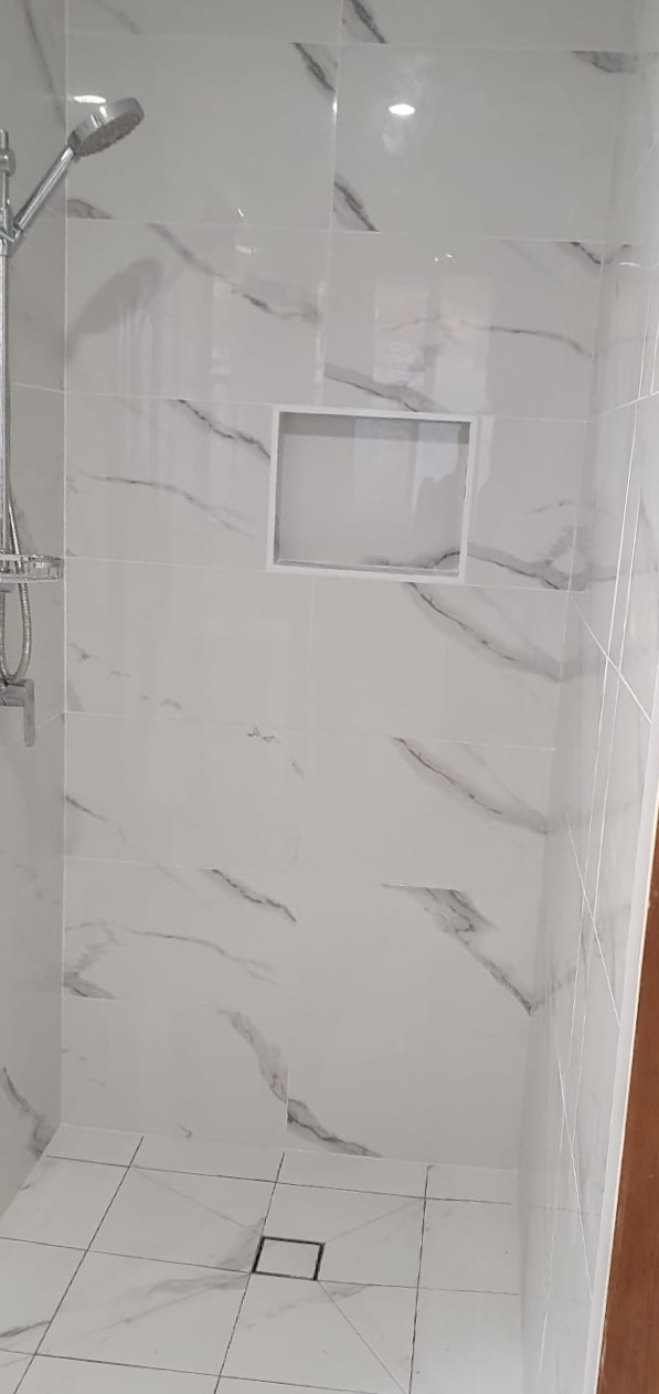 Shower with shower box in laundry