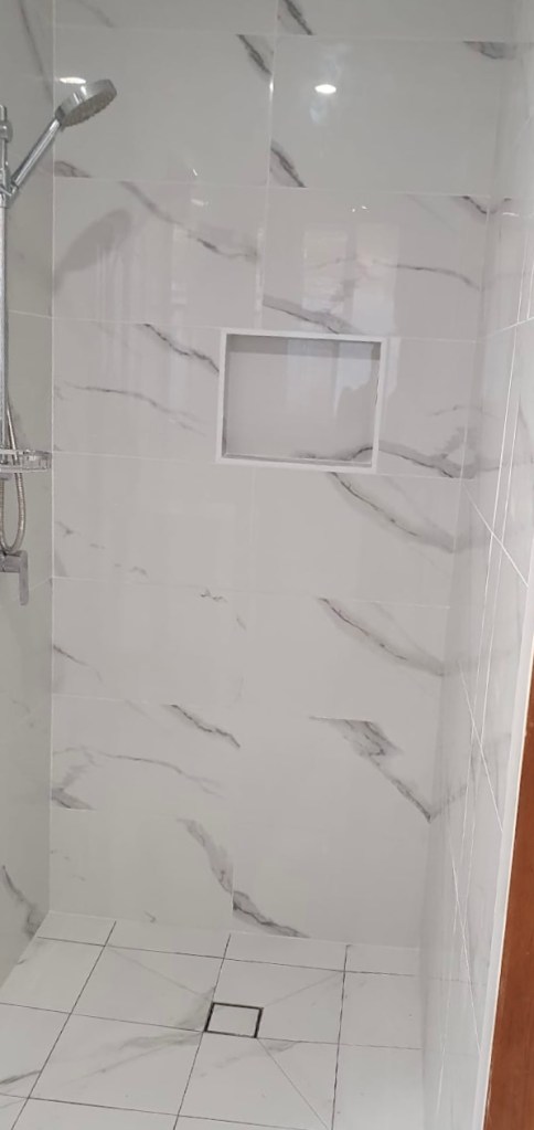 Shower with shower box in laundry